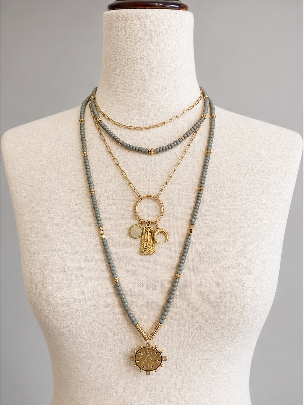 Layered Gold Tone and Gray Beaded Charm Necklace